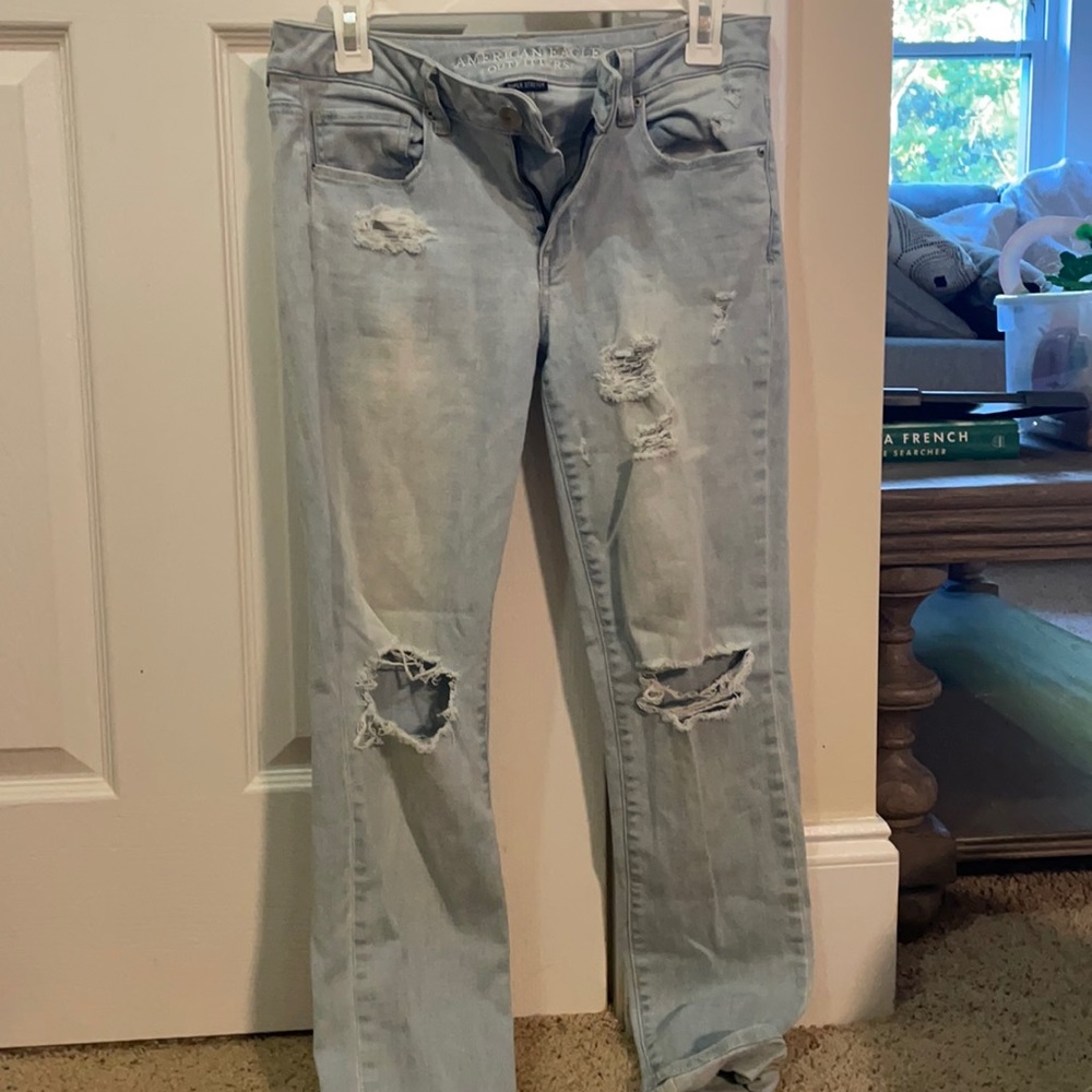 Light blue ripped denim jeans